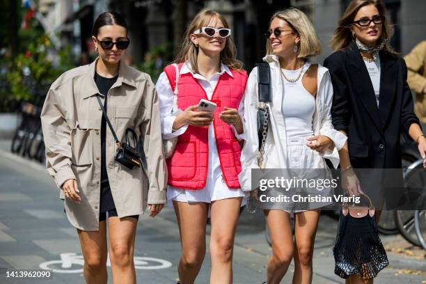 Guests seen outside Ræburn during Copenhagen Fashion Week Spring/Summer 2023 on August 09, 2022 in Copenhagen, Denmark.