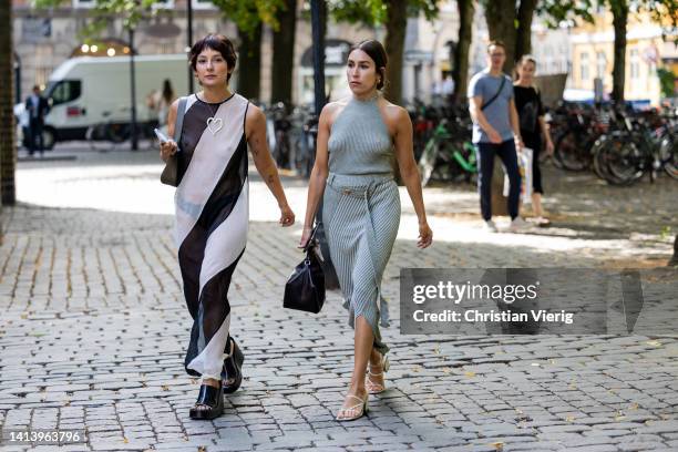 Alyssa Coscarelli wearing black white sheer striped dress & Lauren Caruso wearing grey skirt, top seen outside A. Roege Hove during Copenhagen...