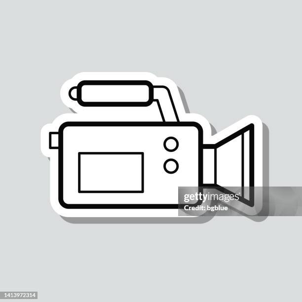 video camera. icon sticker on gray background - cameraman grey background stock illustrations