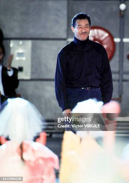 Fashion designer Issey Miyake walks the runway during the Issey Miyake Ready to Wear Fall/Winter 1996-1997 fashion show as part of Paris Fashion Week...