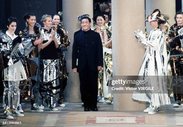 Fashion designer Issey Miyake walks the runway during the Issey Miyake Ready to Wear Fall/Winter 1998-1999 fashion show as part of Paris Fashion Week...