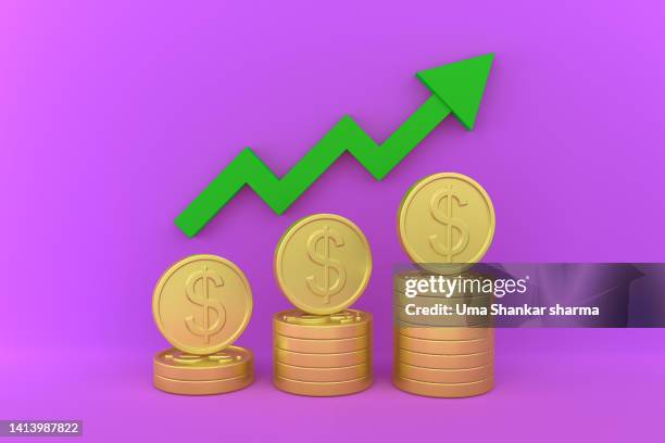 growing stack of golden dollar coins - indian economy business and finance fotografías e imágenes de stock