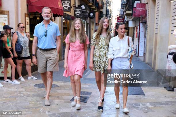 King Felipe VI of Spain, Crown Princess Leonor of Spain, Princess Sofia of Spain and Queen Letizia of Spain are seen walking through the city center...