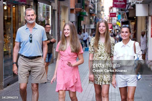 King Felipe VI of Spain, Crown Princess Leonor of Spain, Princess Sofia of Spain and Queen Letizia of Spain are seen walking through the city center...