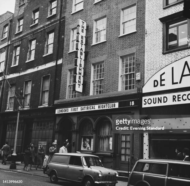 'The Establishment,' with a sign reading 'London's first satirical nightclub,' on Greek Street in Soho, London, England, 2nd May 1962. Founded by...