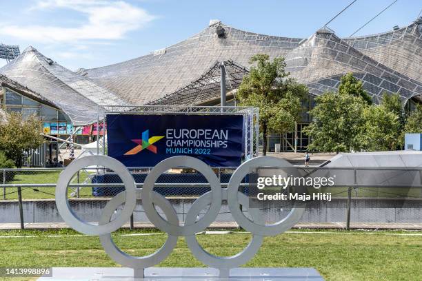 The logo is seen through the Olympic rings in Olympic park ahead of the European Championships Munich 2022 at on August 10, 2022 in Munich, Germany.