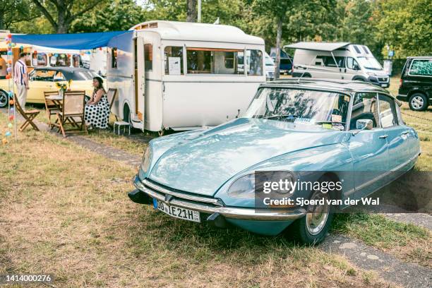 Citroën DS classic French limousine car with a classic caravan on display during the classic days event on August 6, 2022 in Düsseldorf, Germany. The...