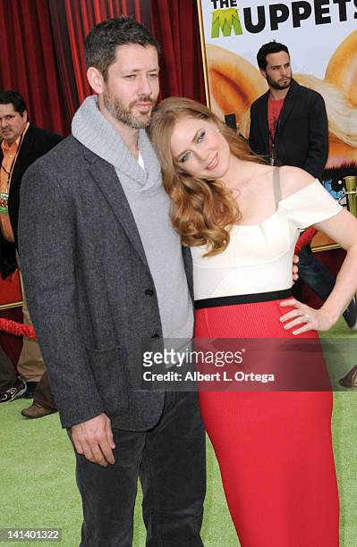 Actor Darren Le Gallo and actress Amy Adams arrive for "The Muppet" Los Angeles Premiere held at the El Capitan Theatre on November 12, 2011 in...