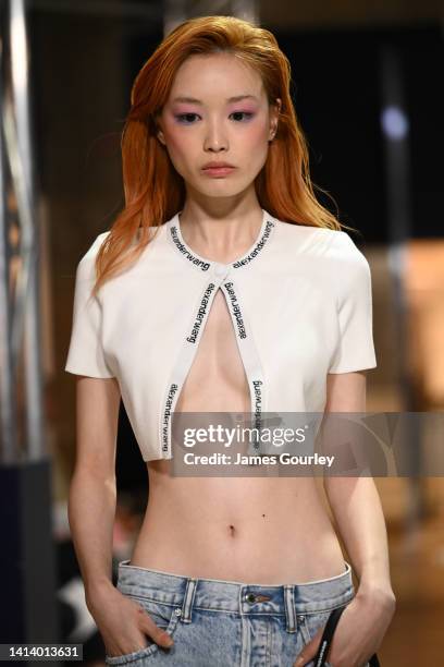 Fernanda Ly wearing T. By Alexander Wang walks the runway during David Jones SS22 Wonderworld Season Launch at David Jones Elizabeth Street Store on...