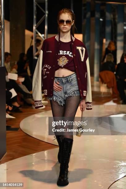 Model wearing Versace & Isabel Marant walks the runway during David Jones SS22 Wonderworld Season Launch at David Jones Elizabeth Street Store on...