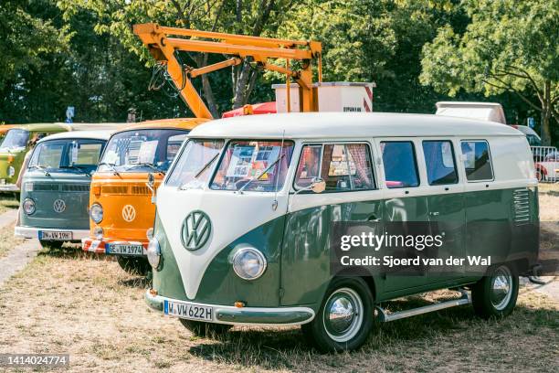 Volkswagen Transporter T1 1950s campervan with Volkswagen Transport T2 vans in the background on display during the classic days event on August 6,...