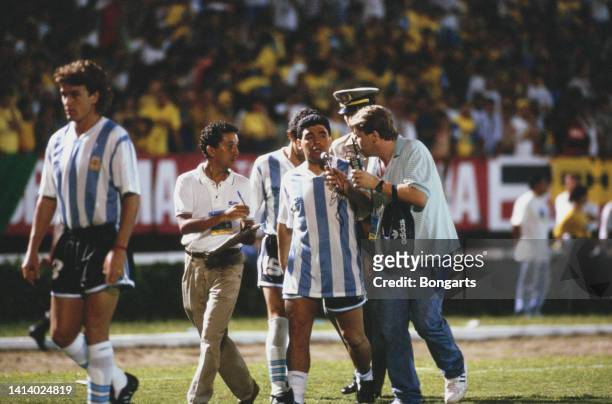 Argentine professional football player Diego Armando Maradona is interviewed by reporters following International friendly match Brazil v Argentina...