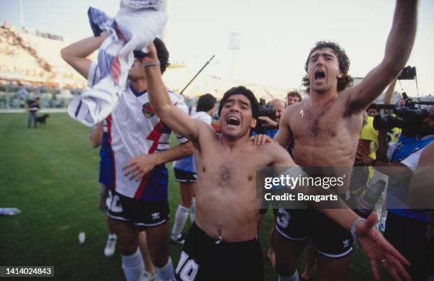 Argentine professional football players Diego Armando Maradona and Nestor Lorenzo celebrate after winning at penalties during the FIFA 1990 World Cup...