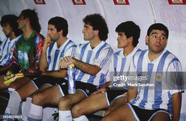 Argentine professional football player Diego Armando Maradona sits on the bench with teammates during International friendly match Brazil v Argentina...