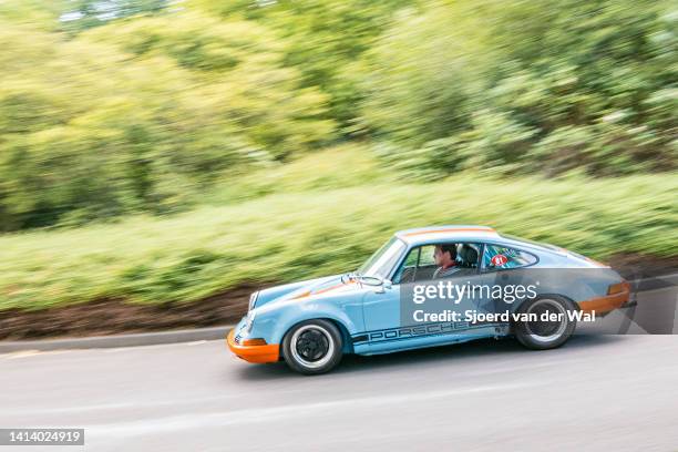 Porsche 911 ST 1970s Le Mans race car performing a demonstration drive during the classic days event on August 6, 2022 in Düsseldorf, Germany. The...