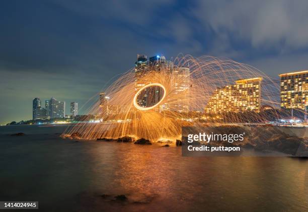 creative light painting by burning steelwool - fuzhou china open 2019 stock pictures, royalty-free photos & images