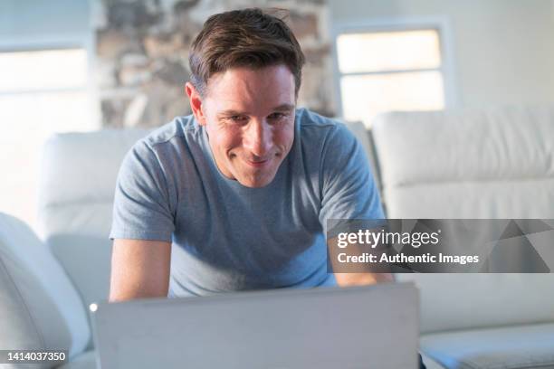 Man Watching Computer African American Man Sitting Infront Of His Computer Photos and Premium ...