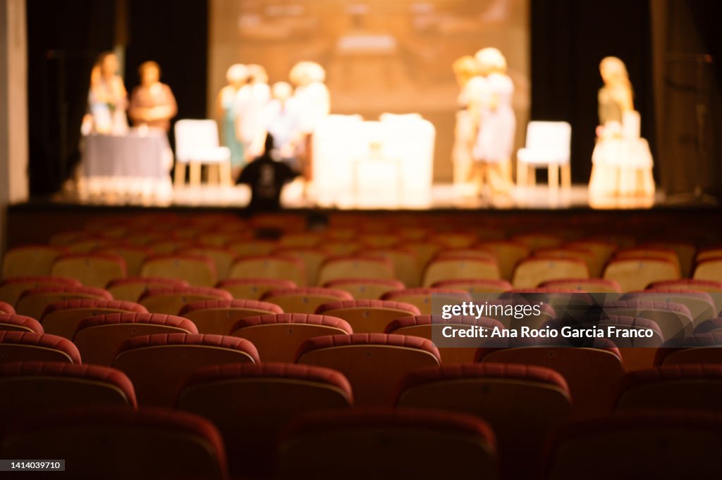 Empty theater red seats during a
rehearsal session