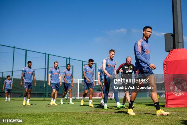 Cristiano Ronaldo, Scott McTominay of Manchester United in action during a first team training session at Carrington Training Ground on August 10,...