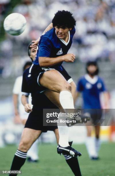 Argentine professional football player Diego Armando Maradona in action mid-air during 1986 FIFA World Cup Round of 16 match between Argentina and...