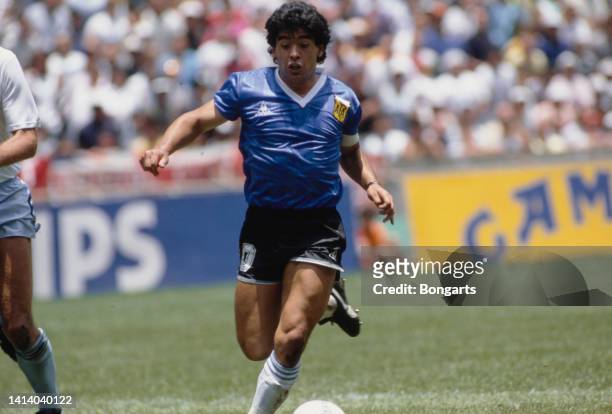 Argentine professional football player Diego Armando Maradona in action during the 1986 FIFA World Cup match between Argentina and England at the...