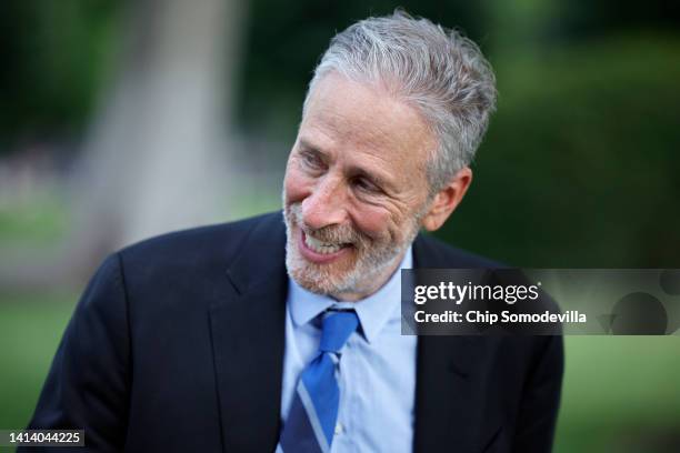 Comedian and activist Jon Stewart stands on the North Lawn of the White House in between media interviews after he attended the signing ceremony for...