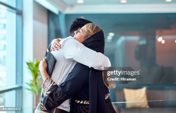 happy, smiling and excited muslim woman hugging her friend together in a kind embrace. couple of close friends showing love in cheerful, romantic relationship holding each other while laughing - funny muslim stock pictures, royalty-free photos & images