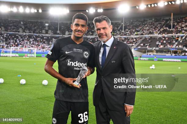 Ansgar Knauff of Eintracht Frankfurt poses for a photo with Zvonimir Boban, UEFA Head of Football and their 2022 UEFA Europa League Young Player Of...