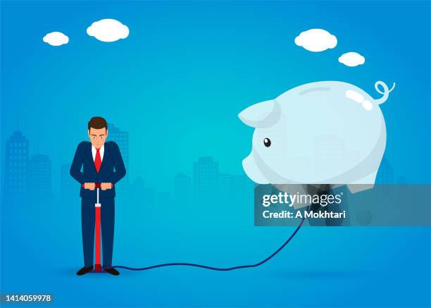 ilustraciones, imágenes clip art, dibujos animados e iconos de stock de ganar dinero, el hombre infla una alcancía, la inversión... - cuenta de banco