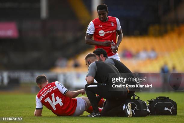 Conor Washington of Rotherham United receives medical treatment during the Carabao Cup First Round between Port Vale and Rotherham United at Vale...