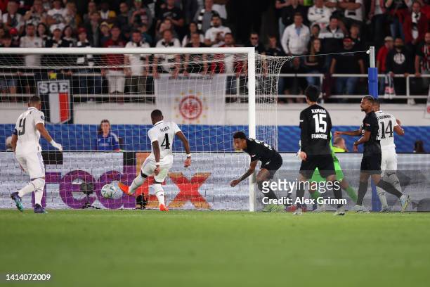 Tuta of Eintracht Frankfurt looks on as David Alaba of Real Madrid scores their side's first goal during the UEFA Super Cup Final 2022 between Real...