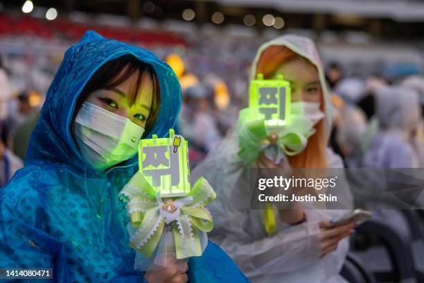 Pop fans pose for camera at K-Pop Super Live to open Seoul Festa 2022 celebrating the return of tourism and events following the COVID-19 pandemic at...