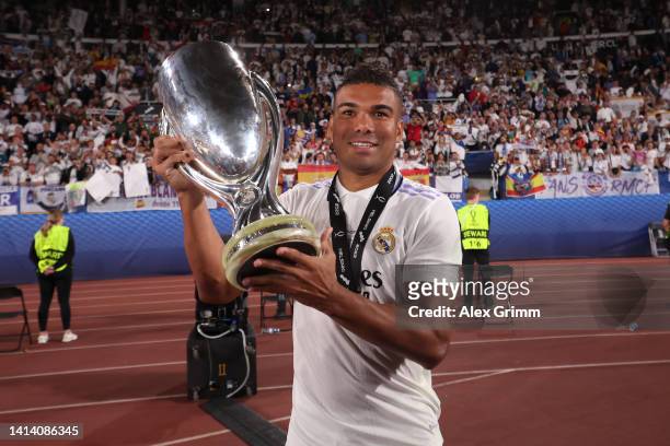 Casemiro of Real Madrid celebrates with the UEFA Super Cup trophy after the final whistle of the UEFA Super Cup Final 2022 between Real Madrid CF and...