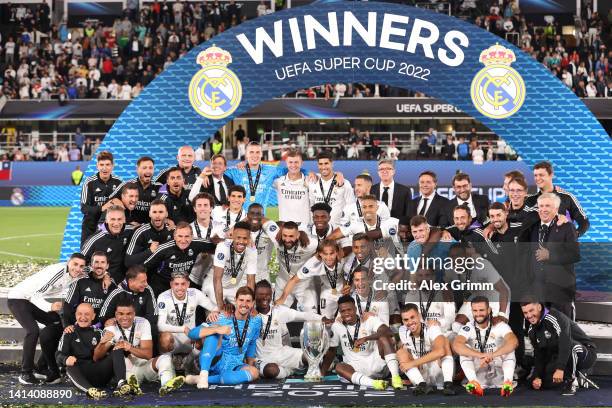 Players of Real Madrid celebrate as Karim Benzema of Real Madrid lifts the UEFA Super Cup trophy after their sides victory during the UEFA Super Cup...