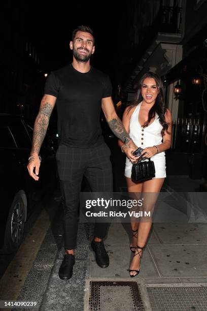 Adam Collard and Paige Thorne seen on a night out at MNKY HSE in Mayfair on August 10, 2022 in London, England.