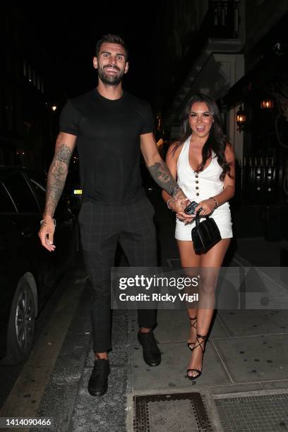 Adam Collard and Paige Thorne seen on a night out at MNKY HSE in Mayfair on August 10, 2022 in London, England.