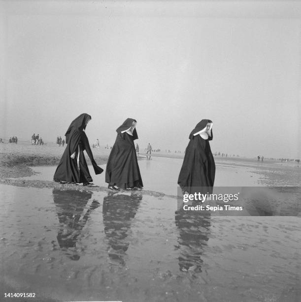 Nuns on the beach at Zandvoort, February 20 beaches, The Netherlands, 20th century press agency photo, news to remember, documentary, historic...