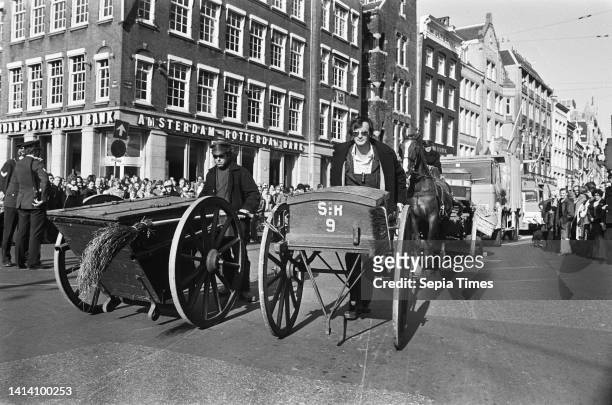 Contrasts in Transport organized by Stichting Paard en Koets in Amsterdam; old garbage carts on Dam Square, October 12 The Netherlands, 20th century...