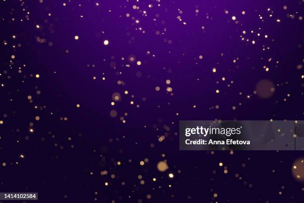 many blurred bright confetti on purple gradient background. festive colorful backdrop for your design - carnaval evento de celebración fotografías e imágenes de stock