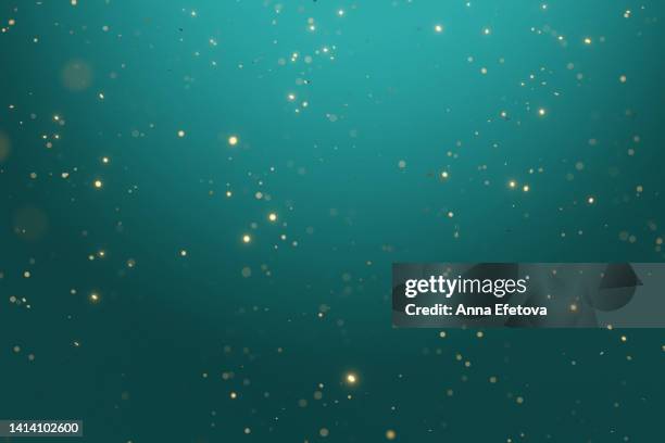 many blurred bright confetti on turquoise gradient background. festive colorful backdrop for your design - sparkle background stock-fotos und bilder