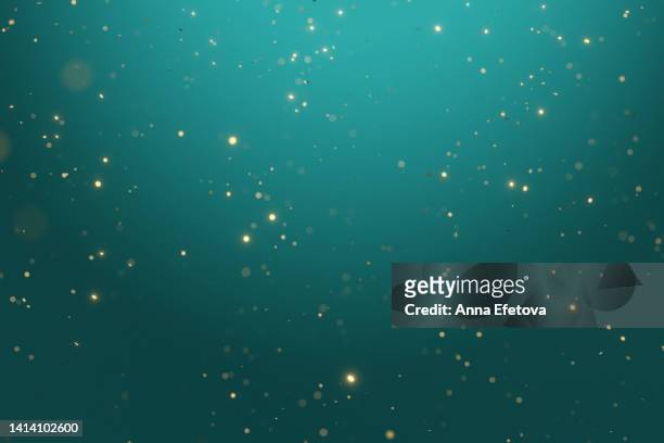many blurred bright confetti on turquoise gradient background. festive colorful backdrop for your design - sparks fly stock pictures, royalty-free photos & images