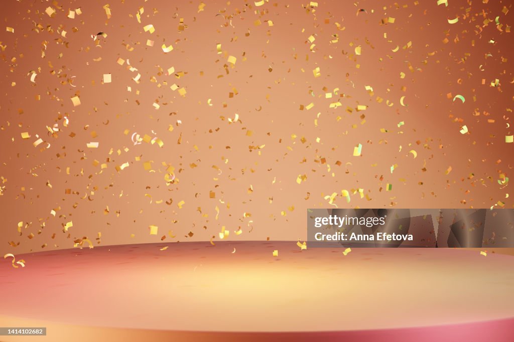 Yellow-pink podium on beige background with many flying golden confetti. Festive place for your products presentation. Copy space for your design