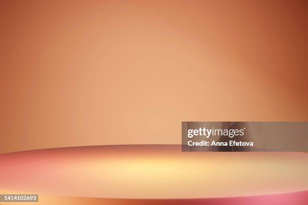 yellow-pink podium on beige background. trendy place to advertise your products. copy space for your design. three dimensional illustration - kulisse bühne stock-fotos und bilder