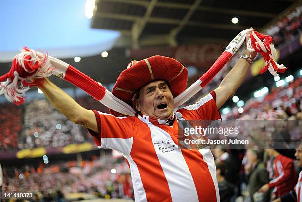 An Athletic Bilbao fan cheers for his team during the start of the UEFA Europa League Round 16 second Leg match between Athletic Bilbao and...