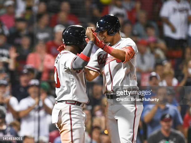 Vaughn Grissom of the Atlanta Braves celebrates with Michael Harris II after hitting a two-run home run against the Boston Red Sox during the seventh...