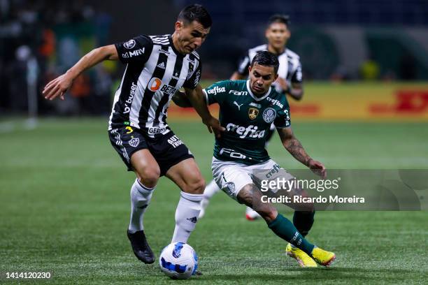 Dudu of Palmeiras fights for the ball with Júnior Alonso of Atletico-MG during a Copa CONMEBOL Libertadores 2022 quarterfinal second leg match...