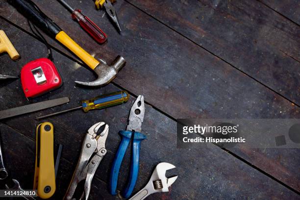 tools on a table at a workshop - verktygslåda bildbanksfoton och bilder
