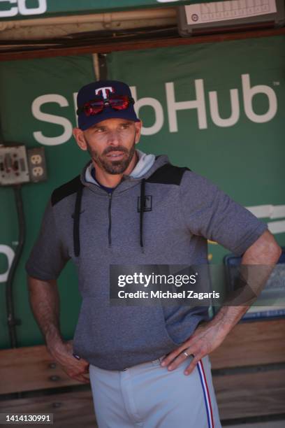 Manager Chris Woodward of the Texas Rangers in the dugout before the game against the Oakland Athletics at RingCentral Coliseum on July 24, 2022 in...