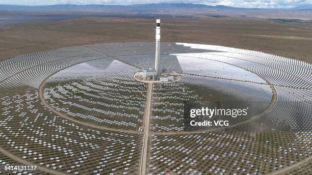 Aerial view of solar panels at a photovoltaic park on August 10, 2022 in Gonghe County, Hainan Tibetan Autonomous Prefecture, Qinghai Province of...