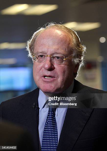 Paolo Scaroni, chief executive officer of ENI SpA, speaks during a television interview prior to a presentation of the company's 2012-2015 strategies...